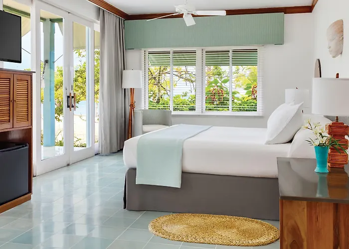 Værelse Deluxe med udsigt over strand med en kingsize-seng